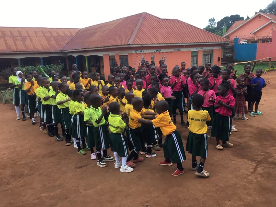 Pupils assembled in front of the classrooms