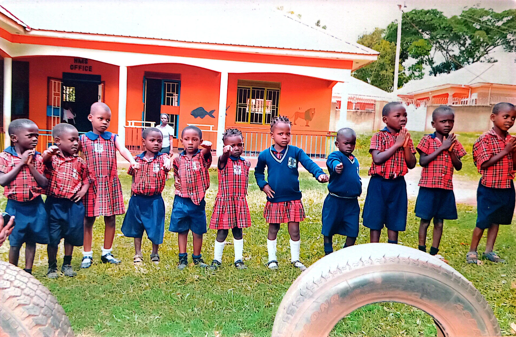Pupils and staff gathered outside the school buildings